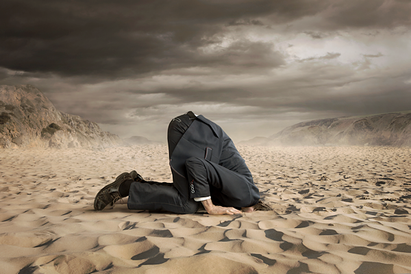 Image of person with their Head in Sand 